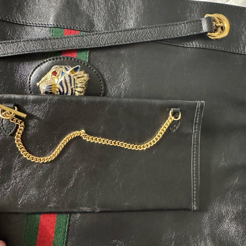 Gucci Black Leather Bag with Gold Accents
